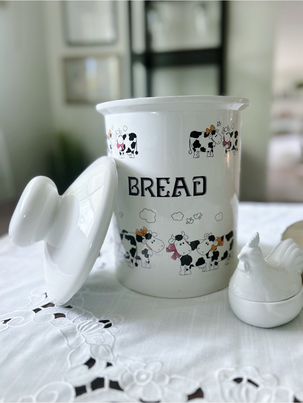 White Ceramic Bread Canister with Cow Motif